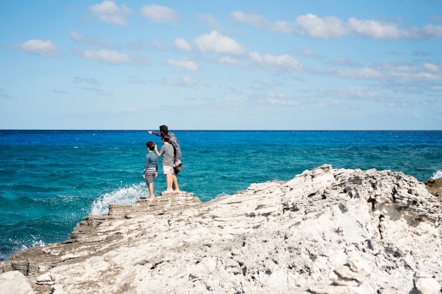 Exploring the blue horizon at Rachel's Bubble Bath in Compass Cay, Exuma